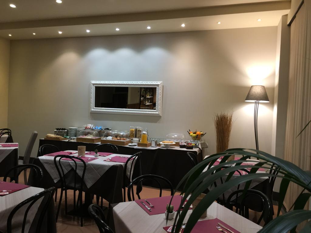 Hotel Est بيومبينوا المظهر الخارجي الصورة